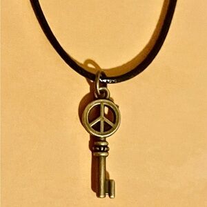 Antique Brass Peace Sign Key Pendant Necklace in Black Cord